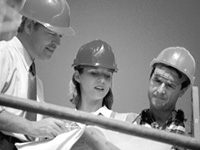Group of people wearing hard hats